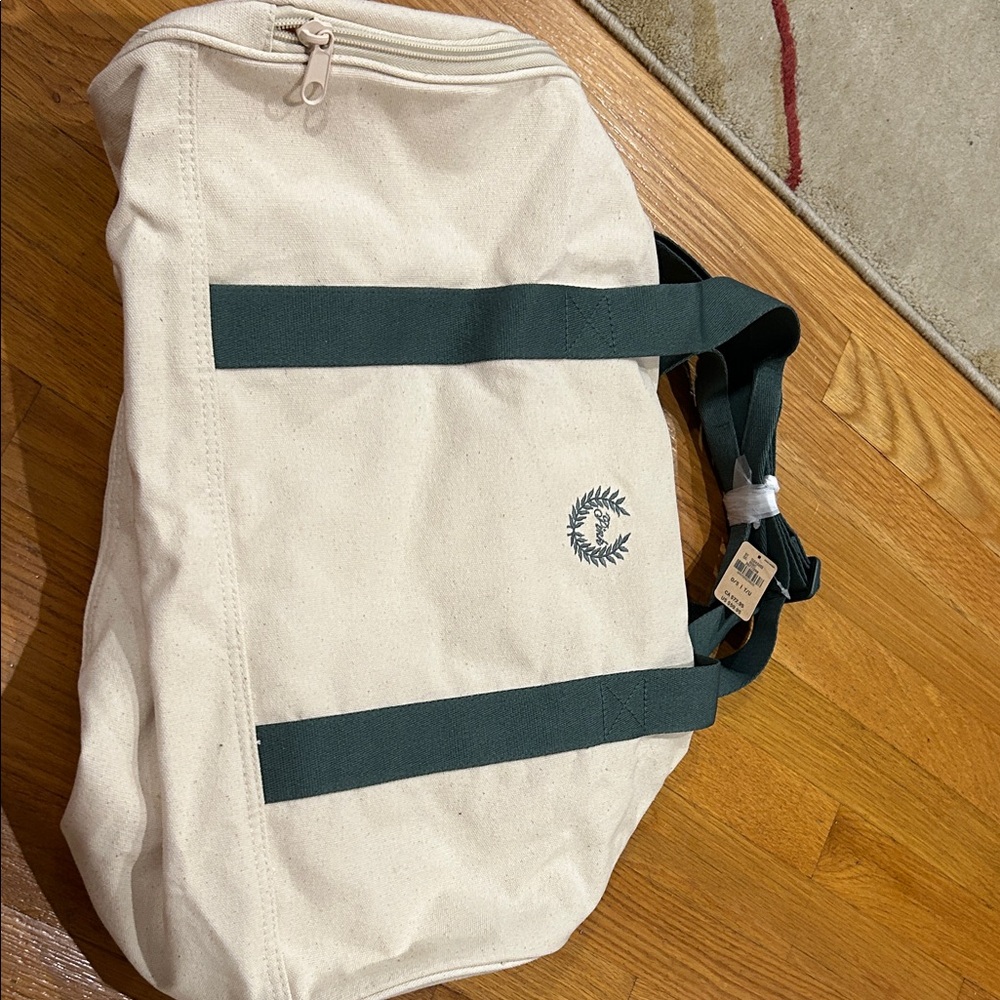 Victoria's Secret Cream and Green Duffel Bag